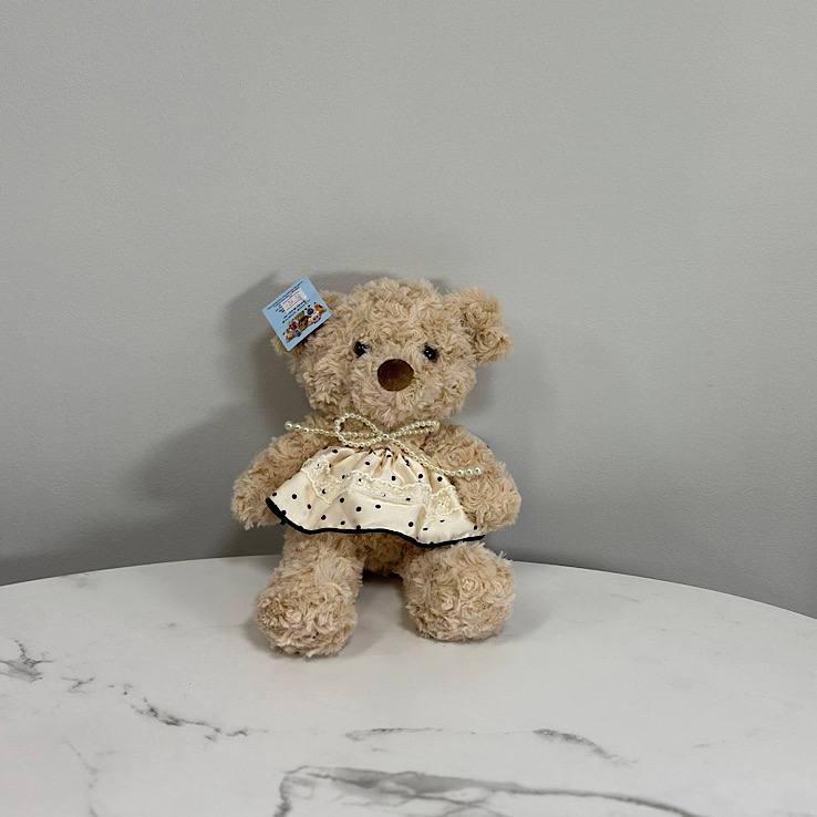 мишка с бусами